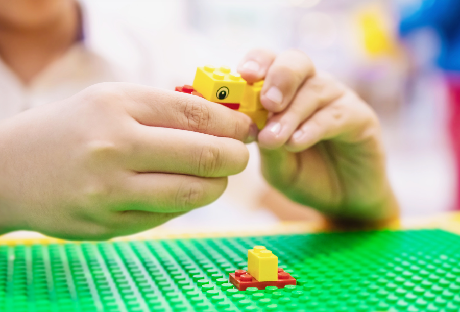 Build-a-duck LEGO activity at a Baseplate Labs party